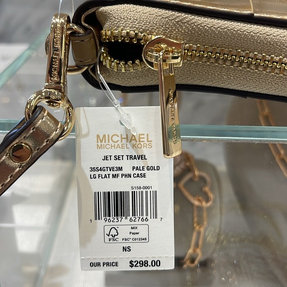 Michael Kors Large Metallic Smartphone Wristlet Wallet 
Pale Gold 
NWT - Picture 11 of 16